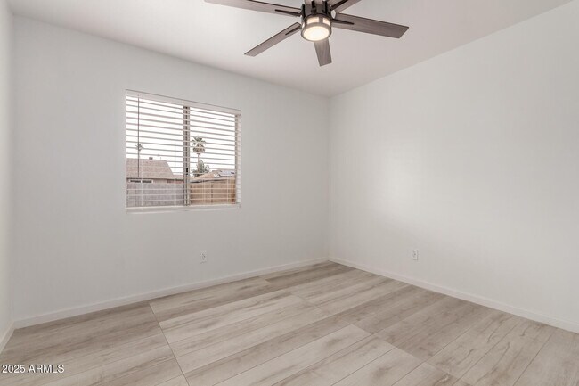 Building Photo - 6038 W Gelding Dr