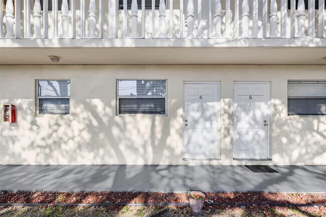Building Photo - 7130 W 11th Ct