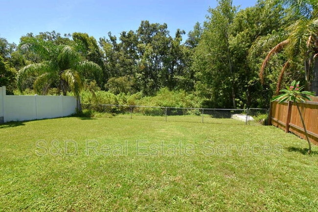 Building Photo - 8212 Riverboat Dr