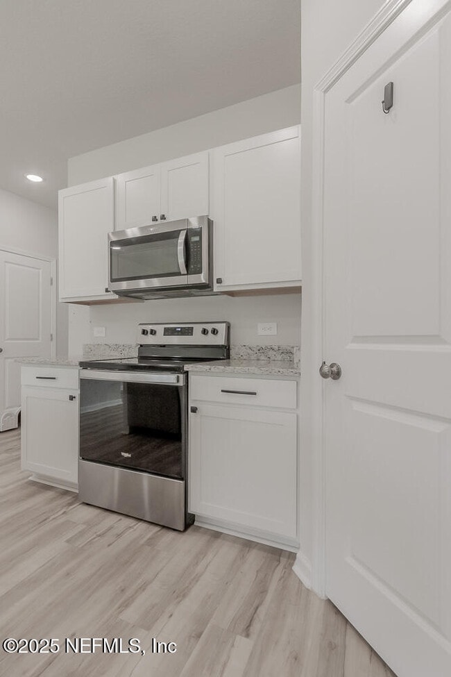 Building Photo - 14438 Macadamia Ln