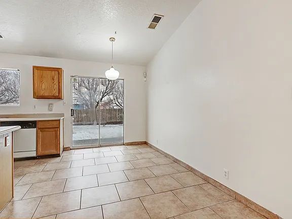 Building Photo - "Spacious 4-Bedroom Gem on Quartz Dr – Your Ideal Albuquerque Retreat!"