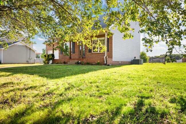 Building Photo - Charming Brick Home with Soaring Ceilings & Updated Finishes!