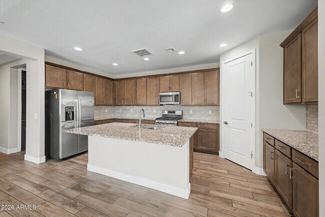 Building Photo - 9701 E Spiral Ave