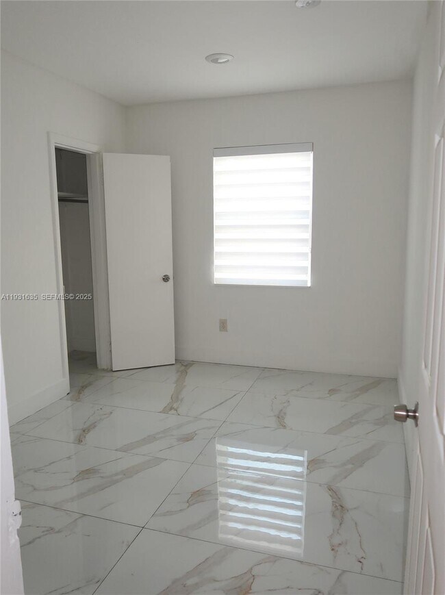 Building Photo - 8900 NW 33rd Ave