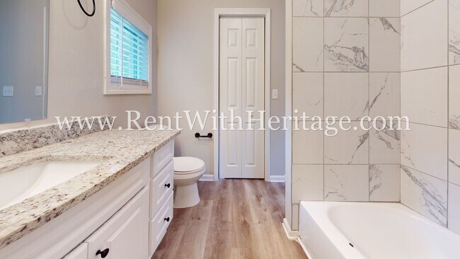 Building Photo - GORGEOUS BRICK RANCH WITH ALL THE UPGRADES...