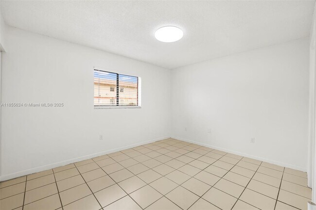 Building Photo - 6165 W 22nd Ct