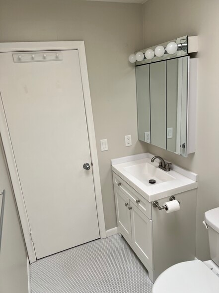 New vanity and fixtures - 215 Beach St