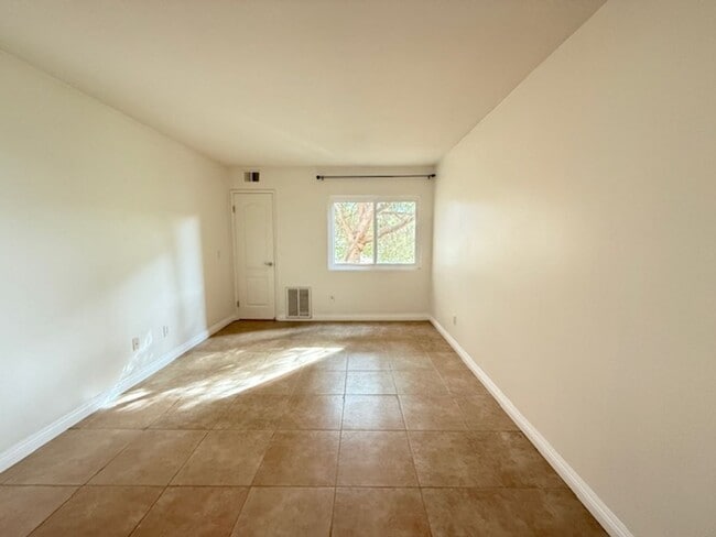 Building Photo - Resort-Style 2BR/2BA First-Floor Condo in Gated Lucera Community Near UTC