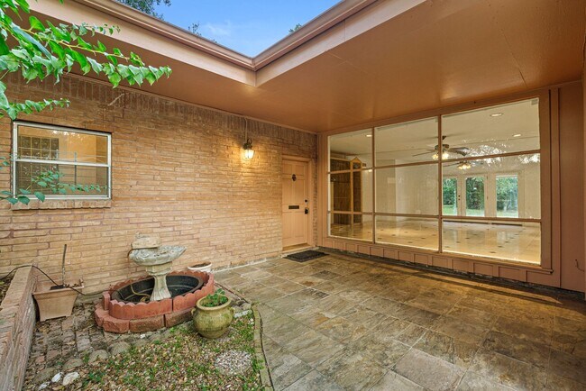 Building Photo - Charming Home with Expansive Backyard on a...