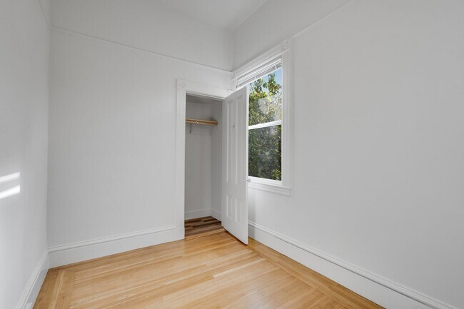 Building Photo - Remodeled pet friendly, top floor 2BR with in-unit laundry