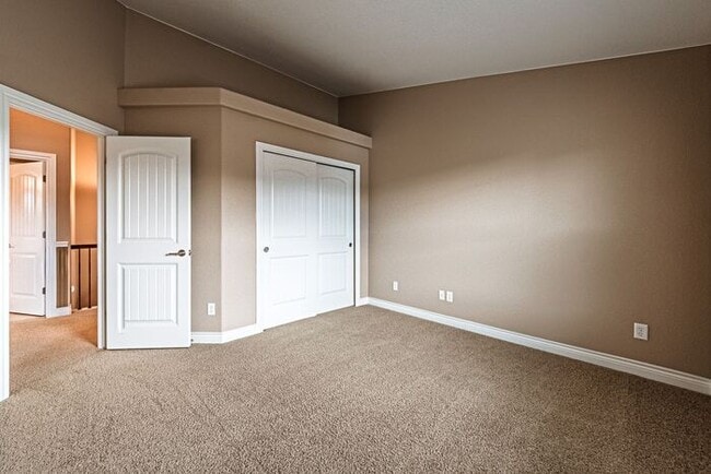 Building Photo - Stunning 5BR Home with Luxury Master Suite & Low-Maintenance Yard!