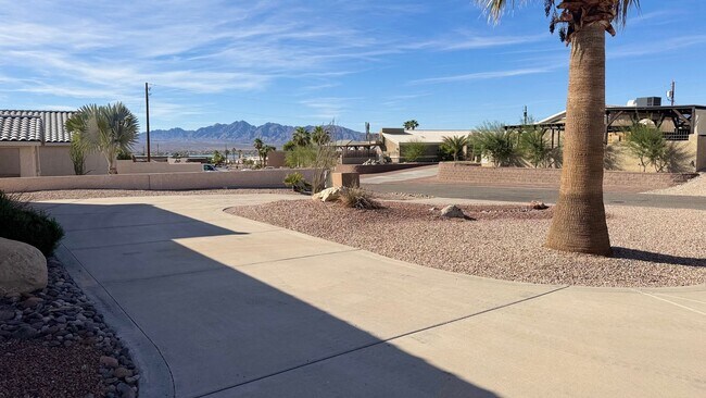 Building Photo - Sunsets, Views & Vibes - Your LHC Escape Awaits!