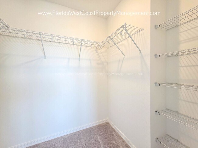 Building Photo - OUTSTANDING BRAND NEW TOWNHOME MOVE IN READY! AZARIO TOWNHOMES LWR !