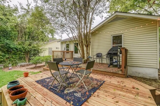 Building Photo - Discover Your Austin Oasis: Revitalized Bungalow with Hardwood Floors and Entertainer's Deck!