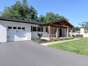 Building Photo - Updated 3BR Home in Beaver Lake | Fenced Yard, Garage, Covered Porch & Outdoor Fireplace | Pet Fr...