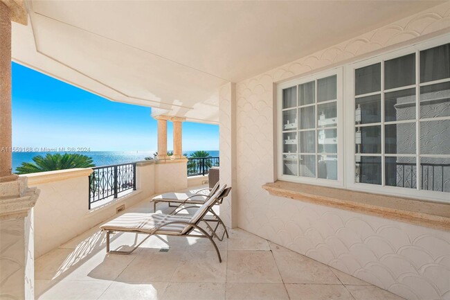 Building Photo - 7642 Fisher Island Dr