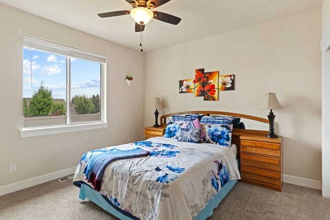 Building Photo - 3-bedroom, 2-bathroom home featuring an op...