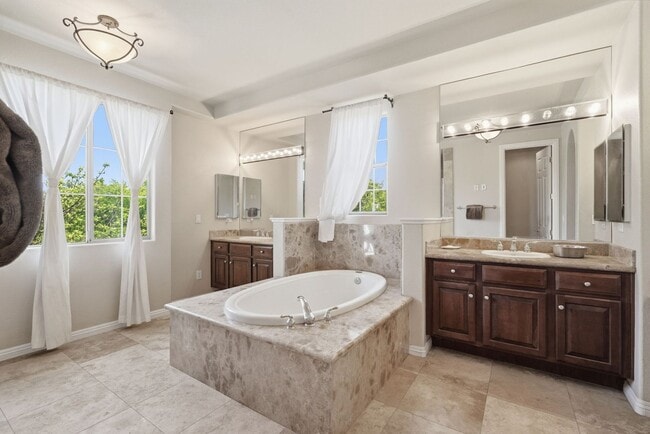 Building Photo - Private Gated Christopher Homes Estate in The Vineyards | Resort-Style Backyard & Strip Views