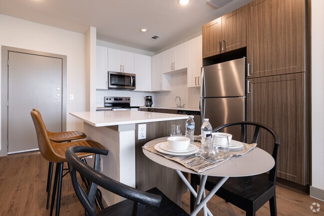 2BR, 2BA - 995SF - Kitchen/Dining Room - The Metropolitan 55+