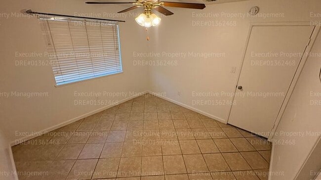 Building Photo - 3 bedroom 2 bathroom home on a corner lot with extra fenced parking.