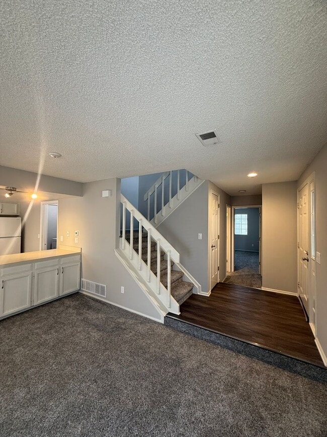 Building Photo - SPACIOUS 2-BEDROOM TOWNHOME WITH LOFT, GARAGE & PRIME LOCATION!