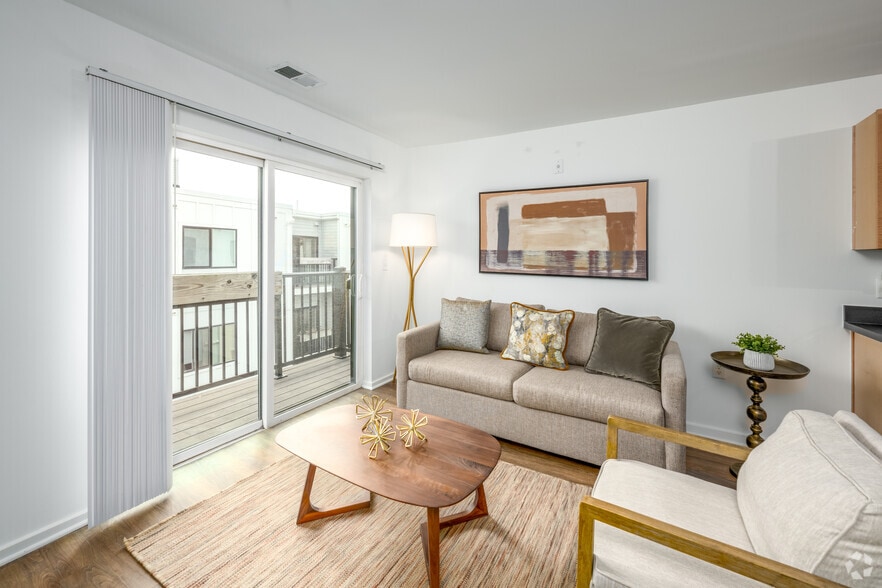 1BR, 1BA - 480SF - Living Room - Metro Village Apartments