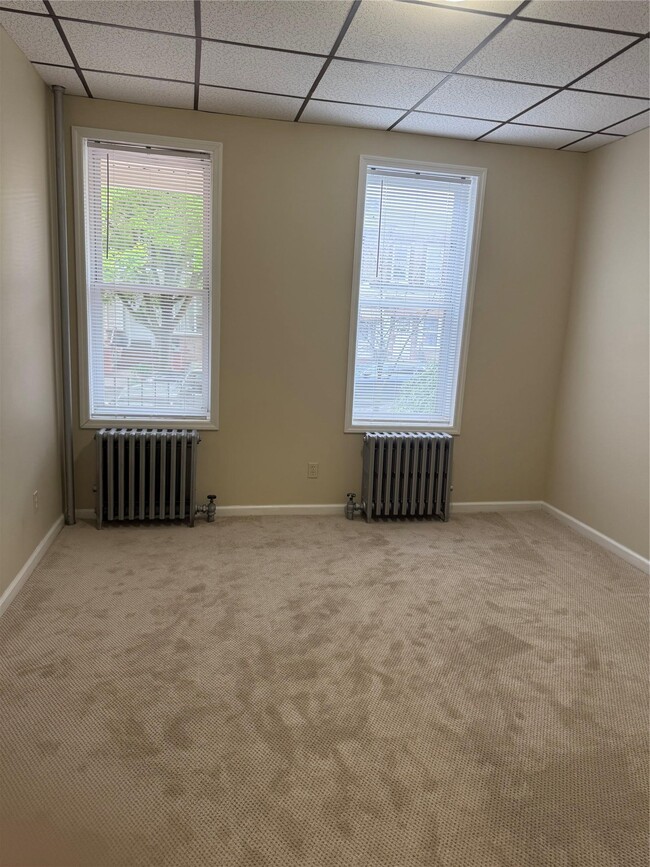 Building Photo - 62-21 60th Dr