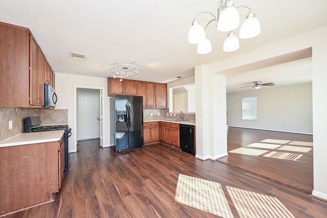 Building Photo - 9403 Coatsworth Dr