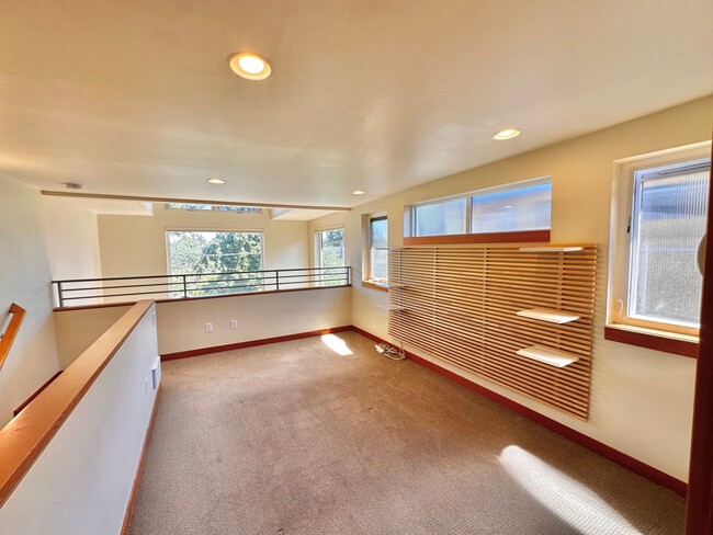 Building Photo - Three-Level Loft-Style 2BR | 3BA with Priv...