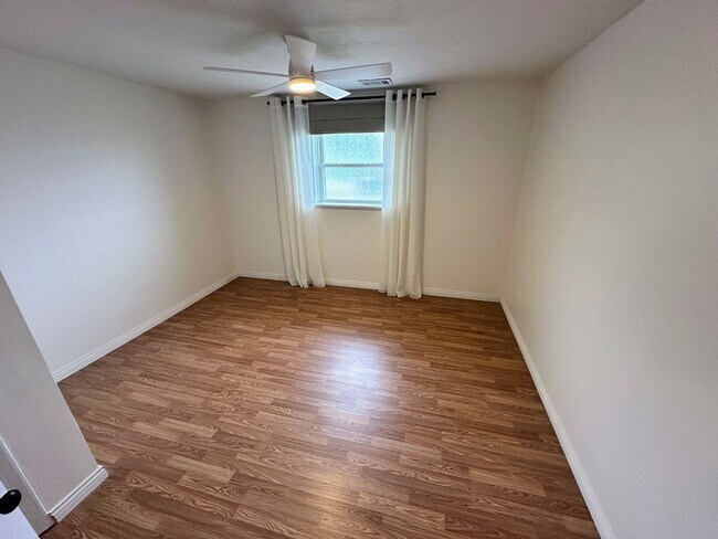 Building Photo - AVAILABLE NOW! Spacious 4 BR, 2 Bath House! Wood Floors, Attached Garage, W/D Included
