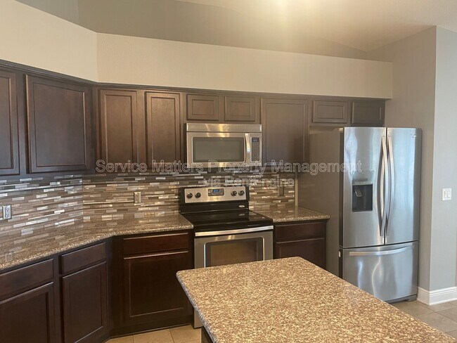 Building Photo - 7063 Harvest Way