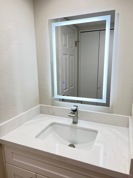 2nd Bathroom with lit mirror and e everything new - 2935 N 68th St