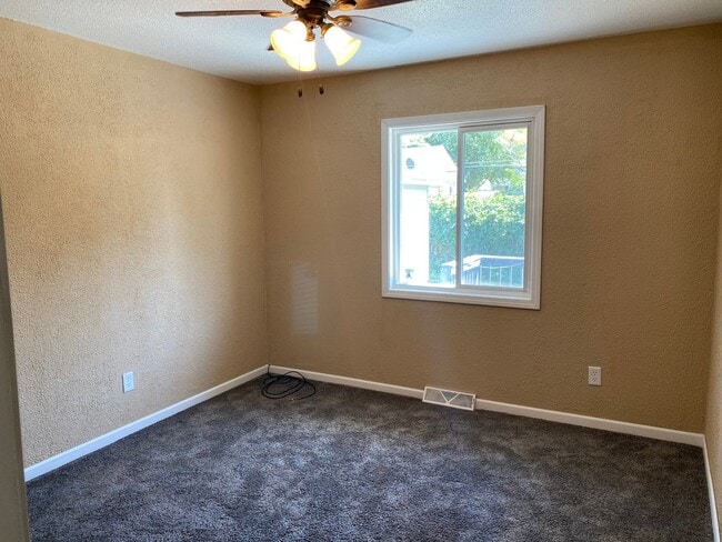 Building Photo - Check Out This Huge 4-Bedroom House!