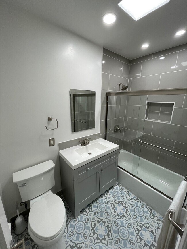 Bathroom and hallway have skylights for plenty of natural lighting - 11025 Kittridge St