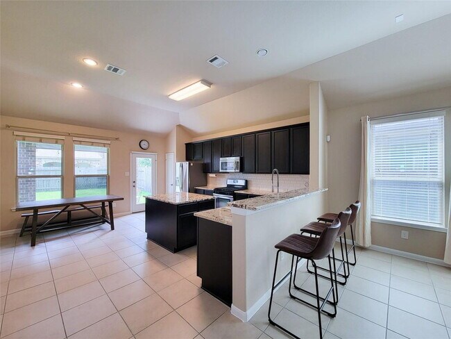 Building Photo - "Charming 3-Bed, 2-Bath Retreat in Humble, TX – Your Perfect Home Awaits on Justin Ridge Ln!"