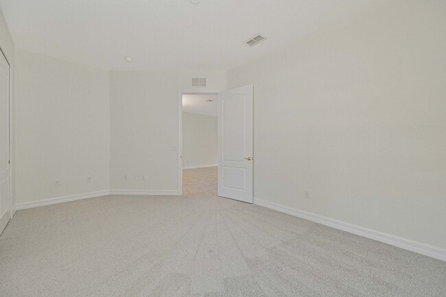 Building Photo - **Coach Home in Jonathans Bay - 3/2 + Den -  Water Views - 2 Car Garage**