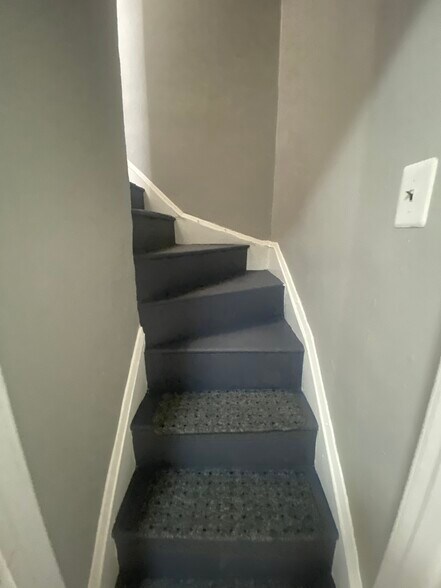stairs to top floor master bedroom - 606 N Woodington Rd