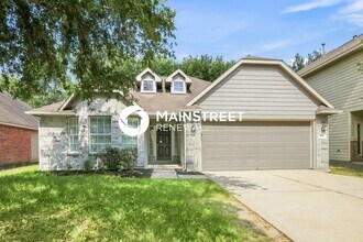 Building Photo - 4 Bedroom Pet-Friendly Home in Conroe, TX with Main Street Renewal