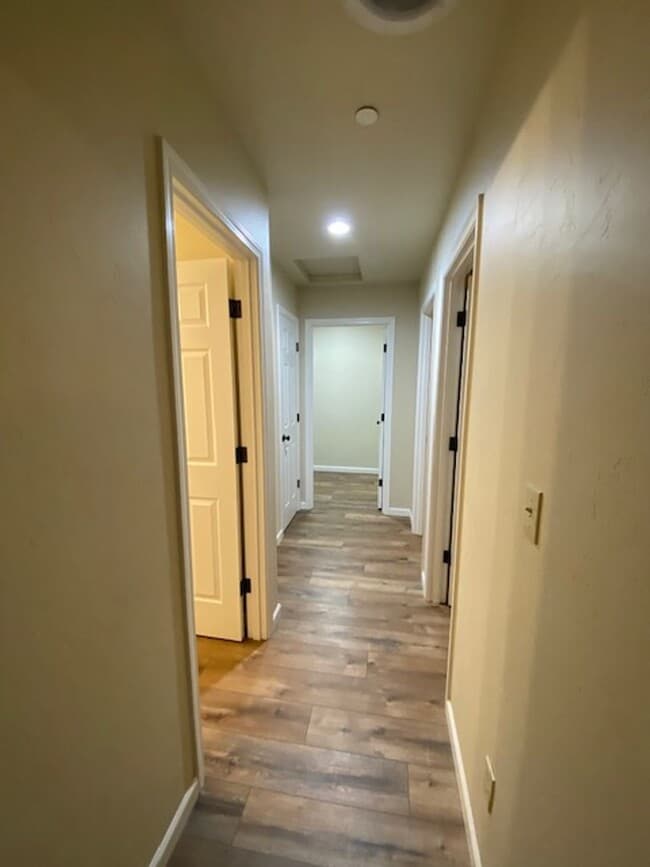 Building Photo - Simply gorgeous 3/2 with 2 car garage, dog...