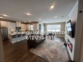 Building Photo - Luxury 2020 Built Townhouse Available June 1, Open Floor Plan, Fireplace, Patio, Primary w/Huge P...