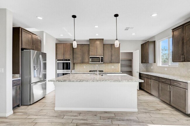 Building Photo - Gated community Located within the Valley Vista Master Plan. 4 Bed 3 Bath features and Open and i...