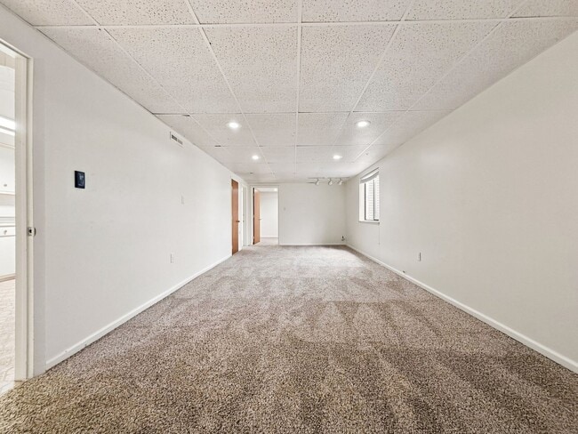 Building Photo - 10841 W 68th Pl
