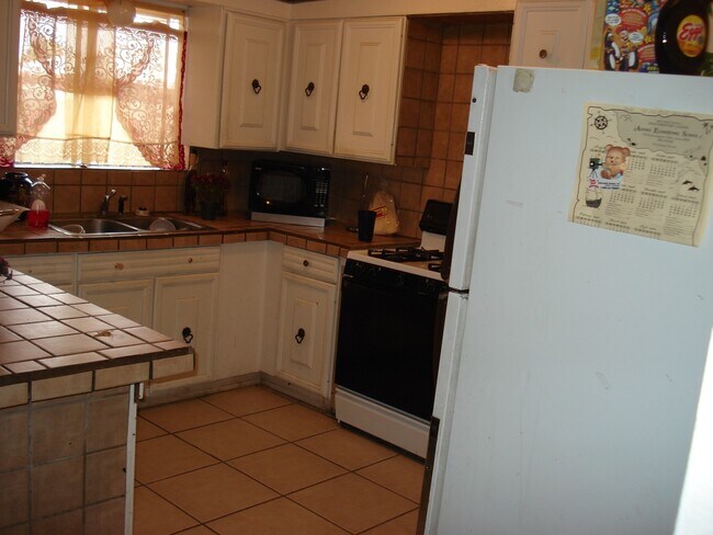 Building Photo - INQUIRE - OPEN HOUSE COMING SOON:   LARGE 4BR/2BA HOUSE, TILE, REMODELED, GREAT LOCATION, NEAR MC...