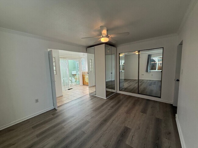 Building Photo - Hard floors, extra closets, patios & fence...