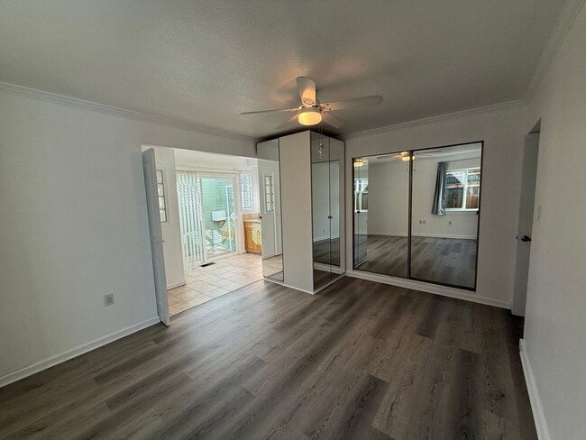 Building Photo - Hard floors, extra closets, patios & fenced yard