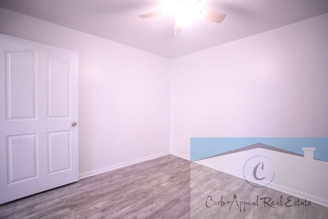 Building Photo - First month move in special $900!! Beautiful 3-bed, 2 bath condo with 2-car garage - includes was...