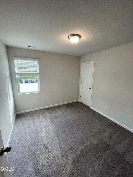 Building Photo - 2021 Wiggins Village Dr