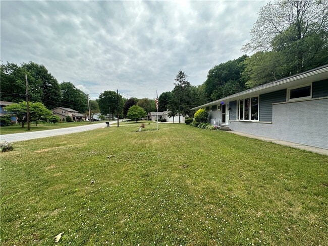 Building Photo - 6840 Haskell Dr