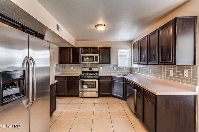 Building Photo - 5448 Colin Powell Ave