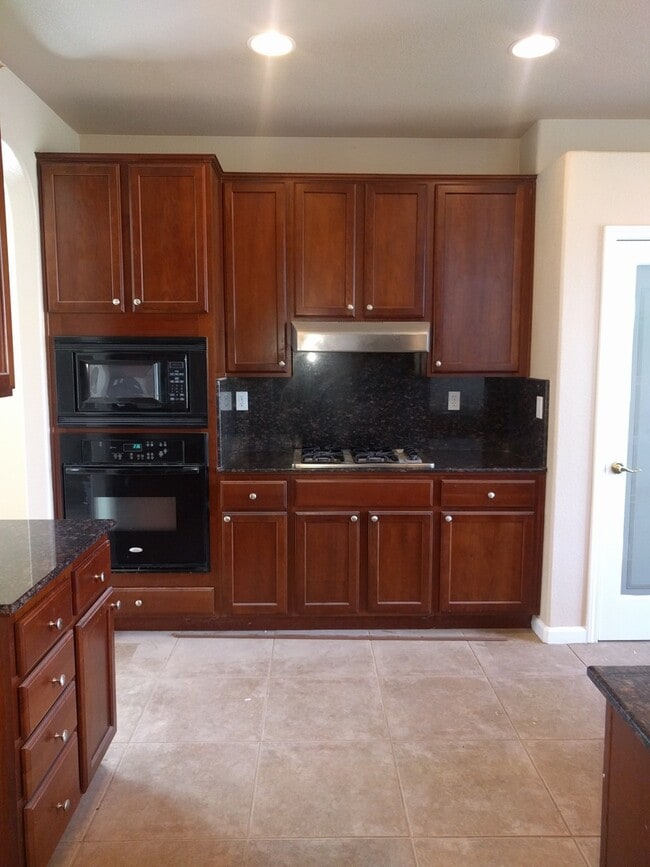 Building Photo - Gated Community Stunner ready to be called home